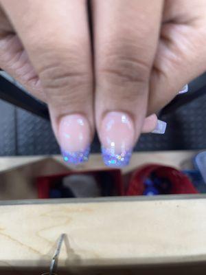 You can still see how uneven my thumb nail was left even after I asked her to fix it. She made the shorter one too short.