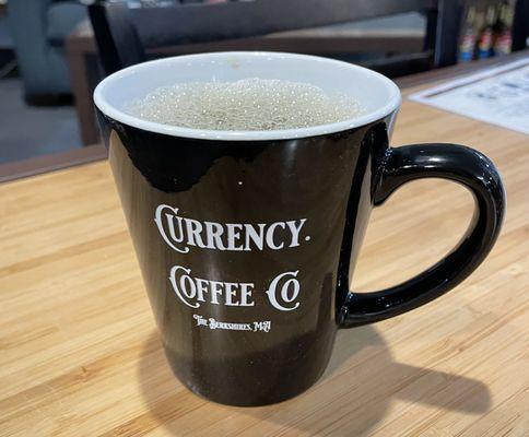 Hot coffee in our Currency® Coffee mug