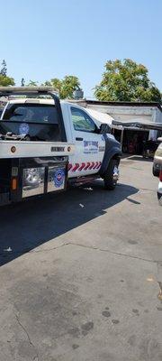 a tow truck at our yard 7759 Alondra, Paramount ca. 90723