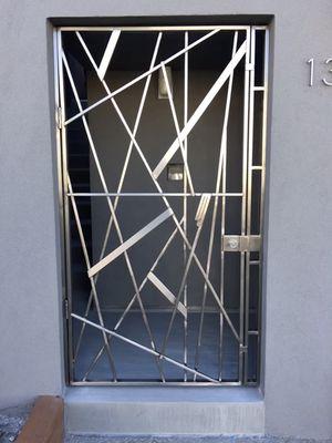 Artist designed Custom Stainless Steel gate for Richmond District Home.