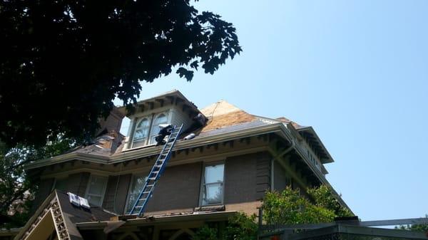 New Roofing going on beautiful home located in New Hope.