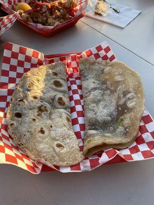 Baleadas sencillas (Flour tortilla with refried beans, cheese, and Honduran sour cream)