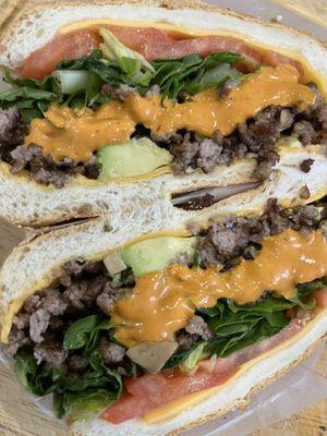 Steak lettuce and tomato with chipotle mayo sandwich