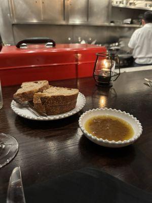 Bread and olive oil with olives