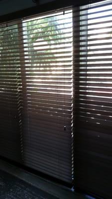 My new horizontal blinds with "de-light" feature. 3 panels on one headrail all operated by one wand. I am so happy!