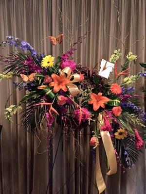 Friends were vacationing in Hawaii called in a floral piece for my dad's funeral and Monarch made this piece as tropical as the islands-