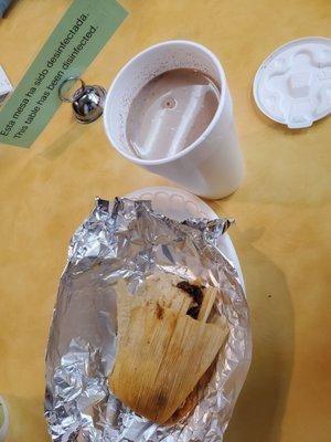 The champurrado(hot corn chocolate) and tamale mole. Tamale so good I can just eat the masa by itself!