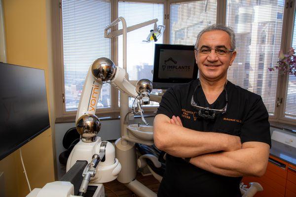 Dr. Mohamed Ali with Yomi Robotic System for Dental Implant Surgery