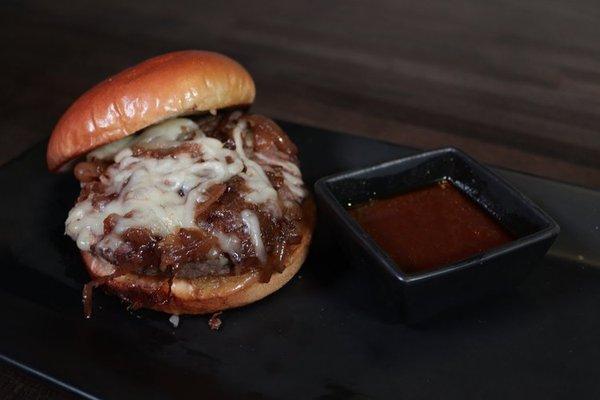 Mouth watering half-pound Brisket burger, covered in Gruyère cheese, caramelized onions, and served with our house-made Au Jus dip.