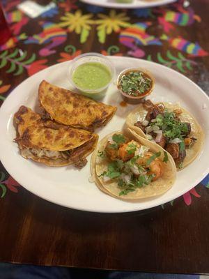 Birria, shrimp and pastor tacos