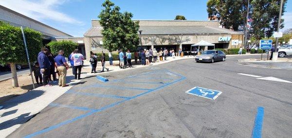 Outside in front of DMV lines are building glad I made a appointment.