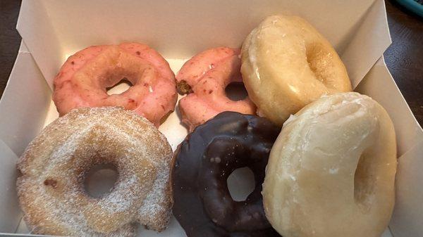 (2) Original Glazed, and Chocolate, Raspberry, Sugar & Cinnamon Cake Donuts.