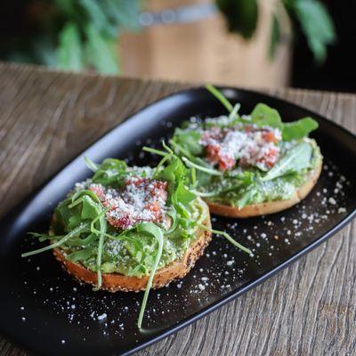 Garden Avocado Bagel - Bagel of choice with avocado spread, pico de gallo, arugula, and cotija cheese