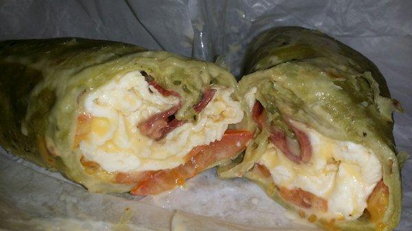 This was heaven!!! Egg white, cheese, tomatoes and turkey bacon spinach wrap