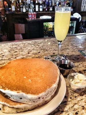 Brunch buttermilk pancakes & $2 mimosa.