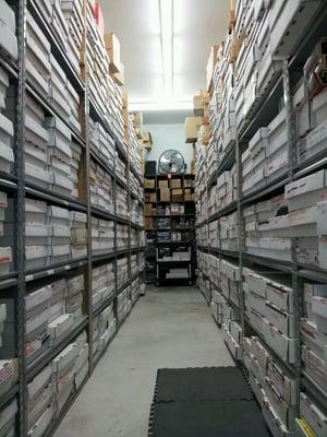 Our Backroom with millions of single sports cards.  Please order online rookieshq.com