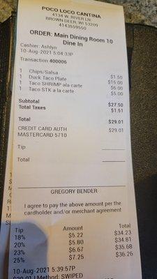 Bill showing I was charged for chips that I didn't ask for and the suggested tip is on the grand total that includes tax