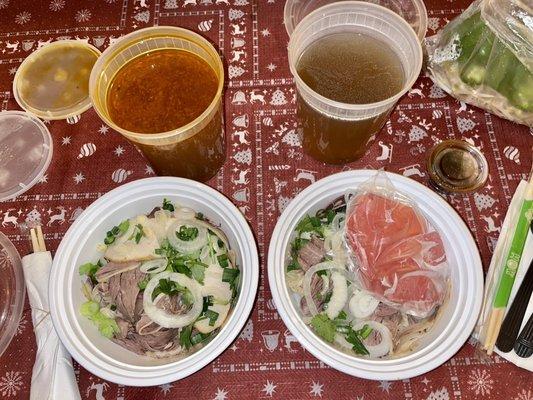 Takeout 20. Pho Dac Biet (has the raw steak on top) and 63. Bun Bo Hue