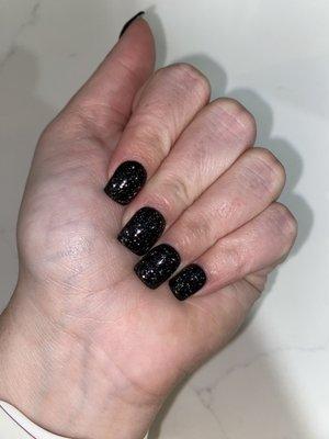 Black sparkle acrylic fill with gel polish, square shaped and short length