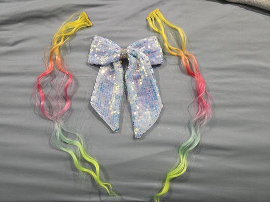 Sequin bow, and multi color hair clip ins. So cute