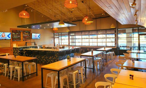 Interior dining, bar. Patio umbrella tables directly past those windows.