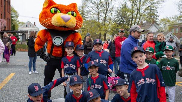 Caddie with little leaguers in Hopkinton, MA.