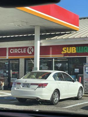 Circle K with a subway, they also sell wine, sodas, hotdogs, and tobacco products