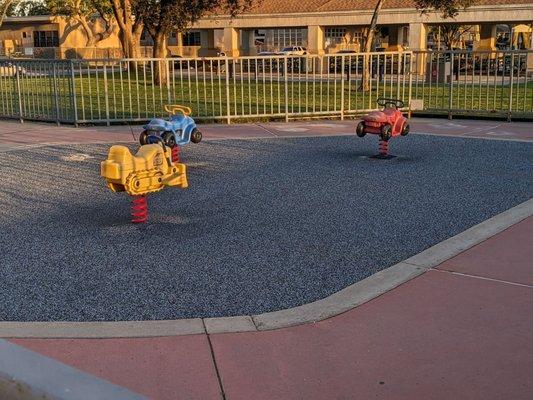 Cute little cars in the playground