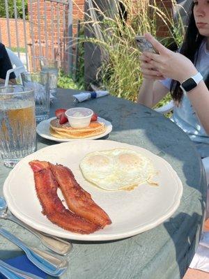 Eggs, bacon, and Strawberry Pancakes