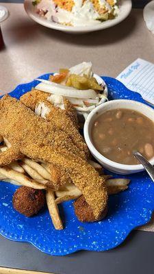 Catfish, fries, coleslaw, pinto beans and hush puppies