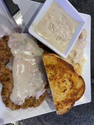 Chicken fried steak and mashed potatoes