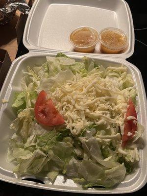 Large tossed salad with house Italian dressing (came with two small cups).