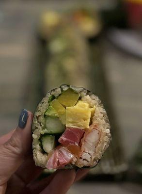 Futomaki - The Roll w/ tuna, salmon, amberjack, deep fried kanikama, avocado, cucumber, takuan, shiso, tamago | $18