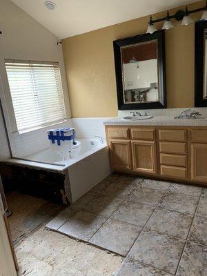 Vanity tiles they didn't want to pay for and made owner try to find at a tile store