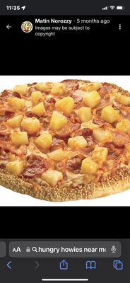 The pick of one of their pizzas online. This is not how the pineapples on my pizza where.