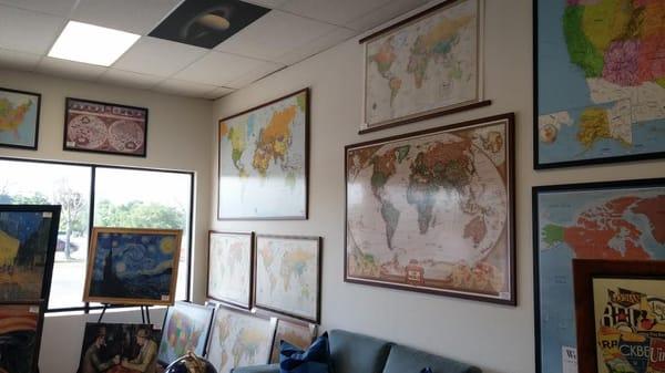 Large framed world wall maps.  We carry many different styles of world maps.