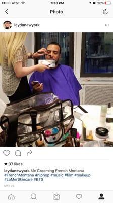 Leyda grooming hip hop star French Montana before his interview..