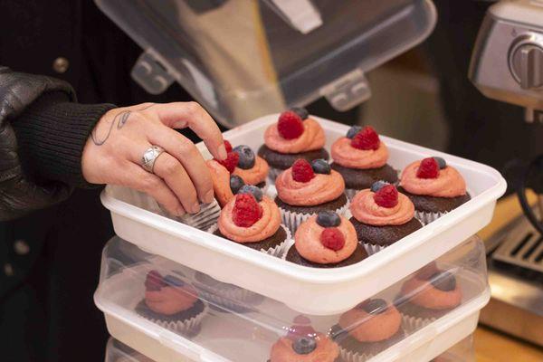 Berry frosting on chocolate cupcakes by Cuzco Coffee