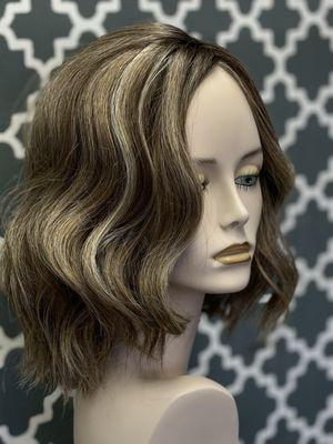 Great wavy bob.  Rooted color.