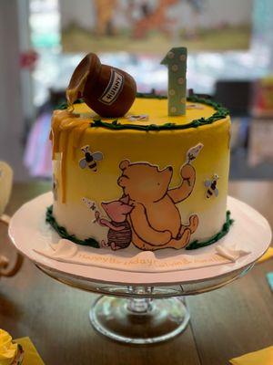 Winnie the Pooh and piglet 1st birthday cake.