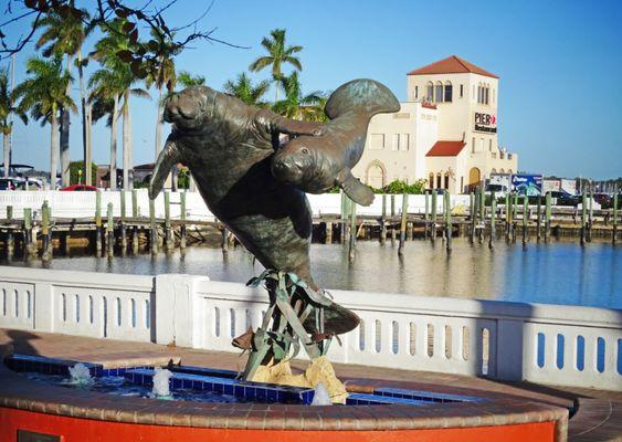 Manatee statue and fountain next to the Pier 22 restaurant in Downtown Bradenton