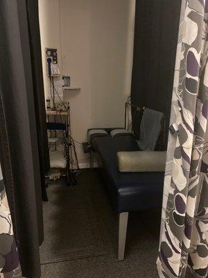 Electrical stimulation treatment room with a table