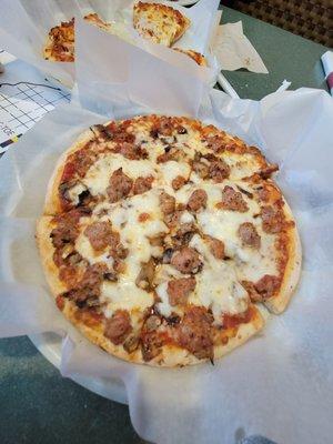 Sausage and mushroom pizza