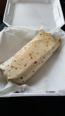 Shredded chicken burrito. Has beans, avocado, rice, cheese inside. But they can make it however you like it.