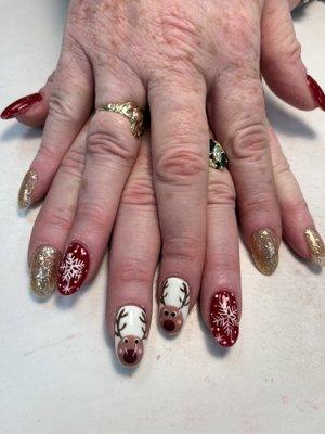 Getting in the holiday spirit with hand, painted nail designs!