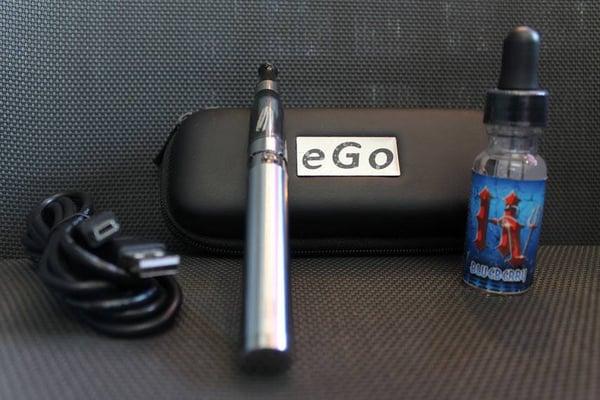 Starter Kits Include: 650mAh Passthrough Battery, Tank, 15mL Juice, Charger & Case/Lanyard