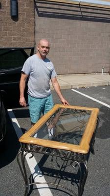 Timmy and our custom cut glass table top.  THANKS TIMMY!