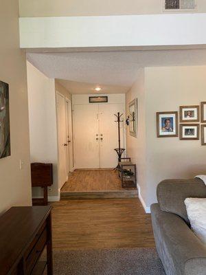 OC DUSTFREE HARDWOOD Vinyl planks in entry way.