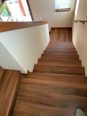 Shaw Optimum Amber Oak LVP stairs with flush stairnore.