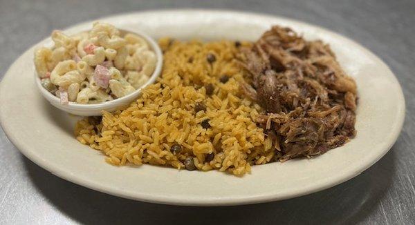 This is rice and beans with our roasted pull pork shoulder and a side of our macaroni salad